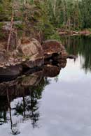 Evening reflections on Cross Bay Lake, June, 2010