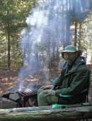 Spartan1 by the fire at breakfast, June 3, 2013, Brule Bay campsite.