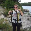 My wife.  Her 1st trip to Q and her 1st walleye ever.