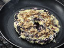 Blueberry cornbread bannock with brown sugar.