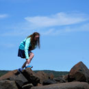 Anna on Lake Superior rocks at Grand Marais (by Artist's Point),  August 2017.