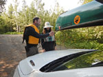 A lesson from Grandpa in tying down the canoe.