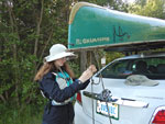 Tying down the canoe.  Grandpa must have taught her correctly, as it stayed in place just fine all the way back to Michigan!