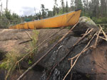 More than one way to get a boat down a rock.