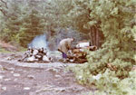 Spartan2 preparing breakfast on Agnes, Quetico 1977.